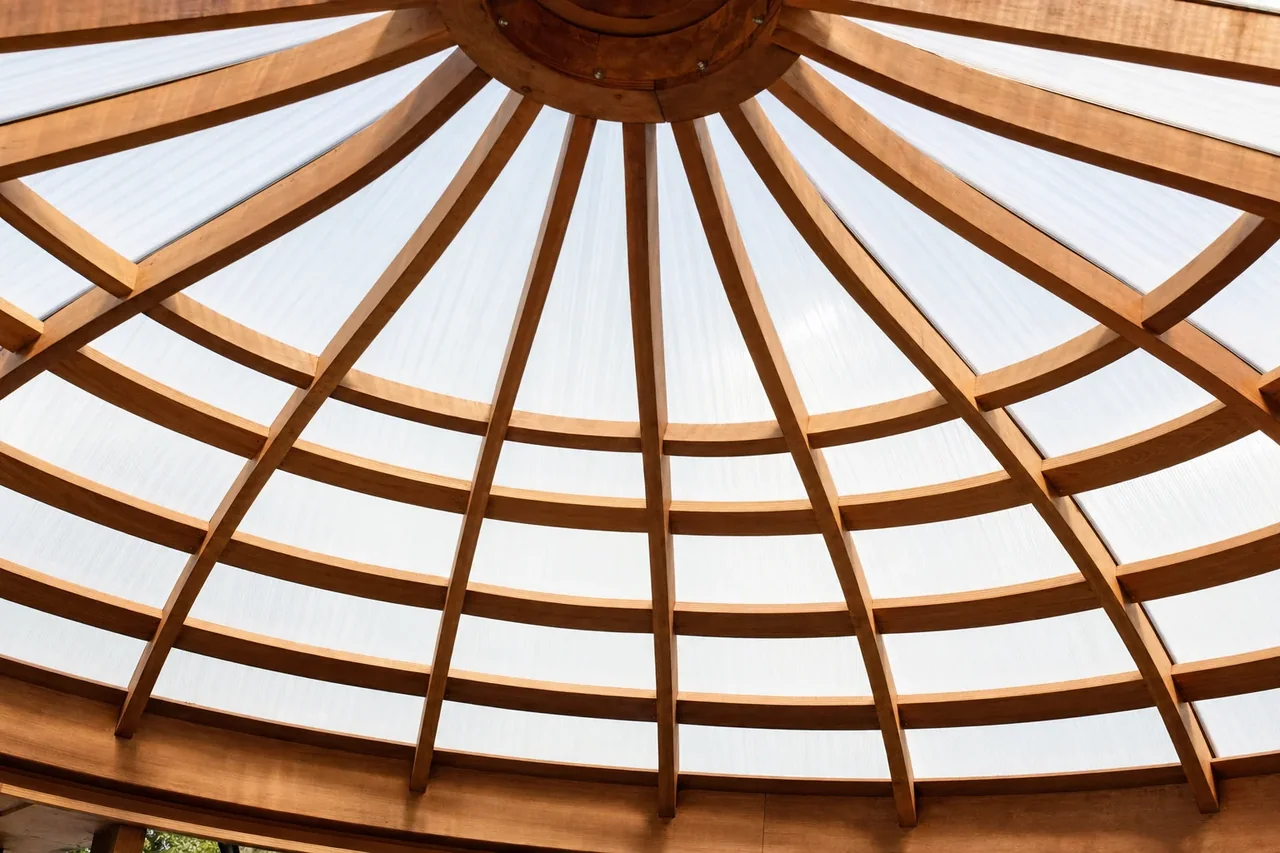 Polycarbonate light panels in a dome patio roof letting daylight into a Perth alfresco
